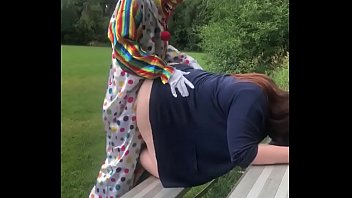 Clown fucks girl in soccer field