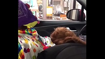 Clown gets dick sucked while ordering food