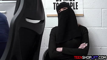 Blonde teen trying to get away with stealing wearing a muslim outfit